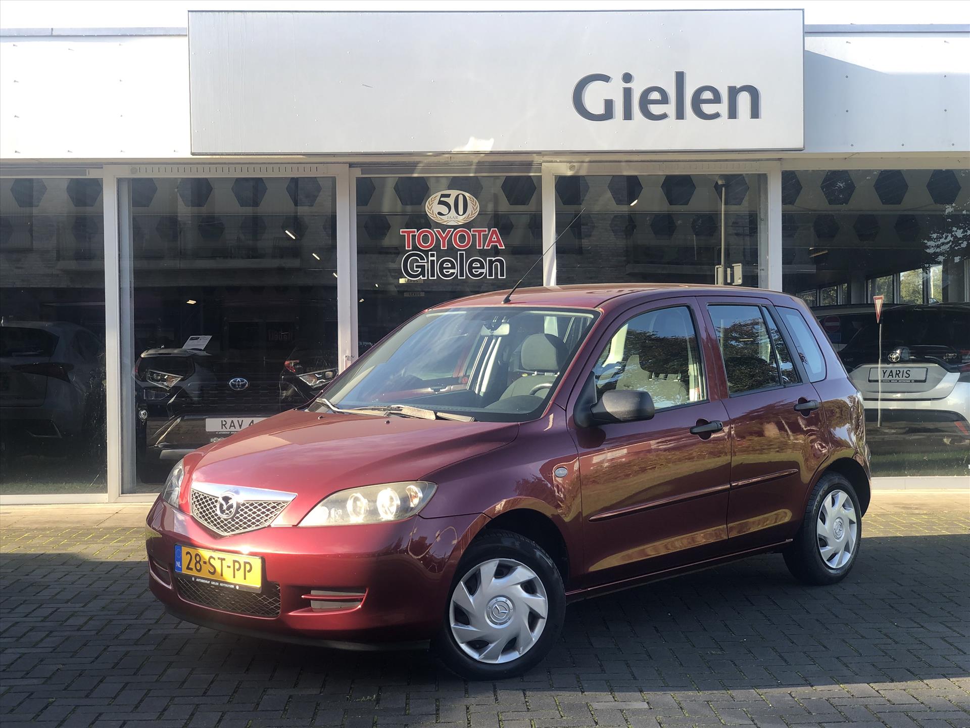 Mazda 2 1.4 Automaat Exclusive | Airconditioning, Stuurbediening, Elektrische ramen, Centrale deurvergrendeling, Weinig KM! 39923991-0.jpg | Autobedrijf Gielen