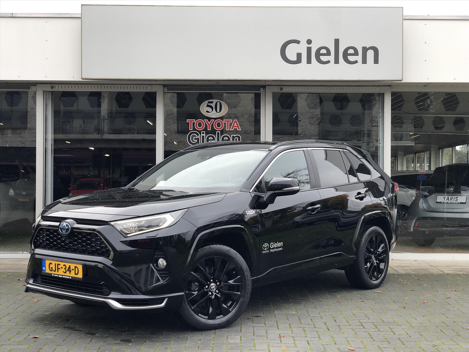 Toyota RAV4 2.5 Plug-in Hybrid AWD Style Black Edition | 19 inch, Head up display, Dodehoekherkenning, Stuurverwarming, Parkeersensoren 41149482-0.jpg | Autobedrijf Gielen
