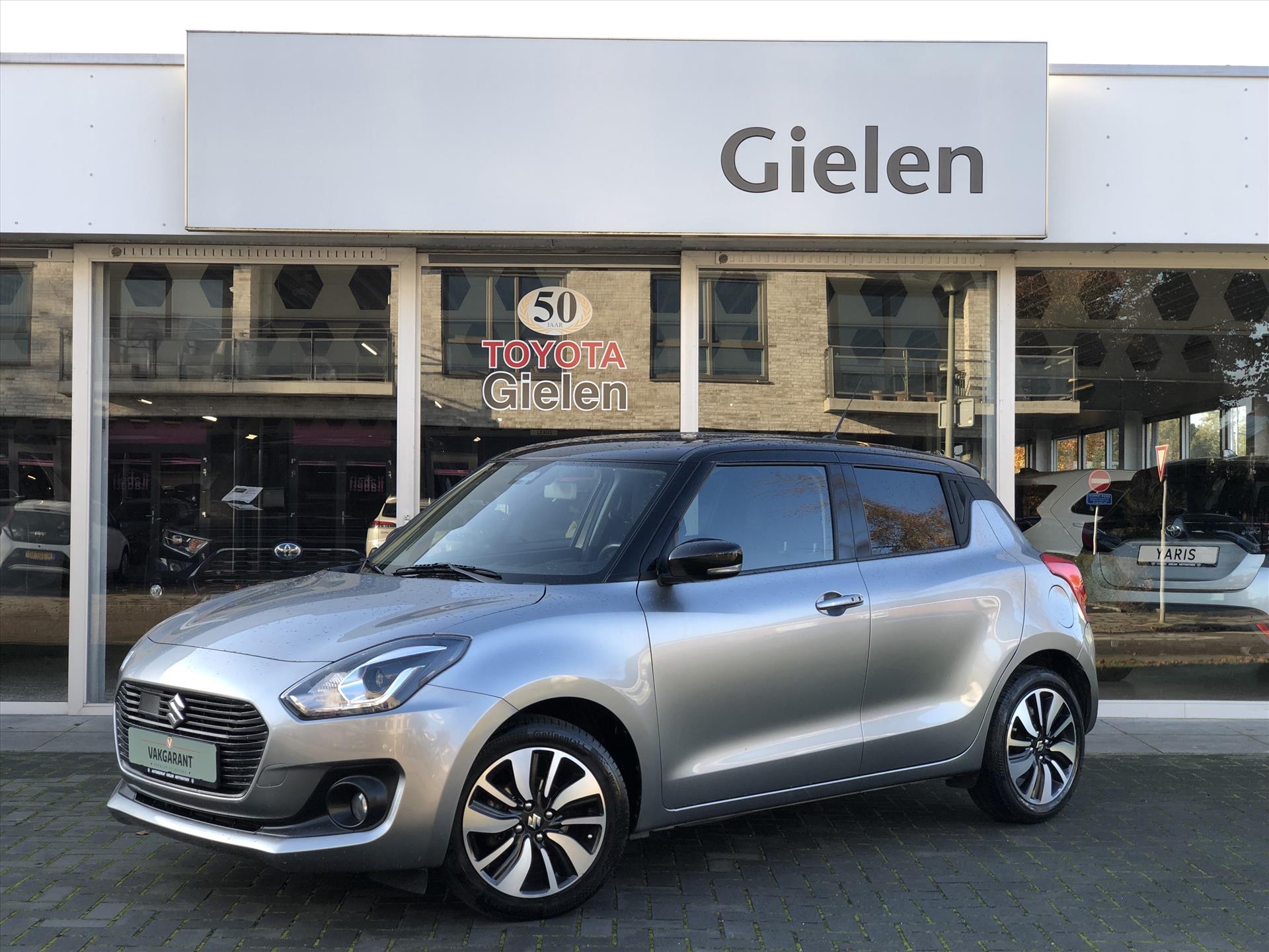 Suzuki Swift 1.2 Smart Hybrid Stijl Bi-Tone | Eerste eigenaar, Adaptive cruise control, Stoelverwarming, Navigatie, LED, CarPlay 41277756-0.jpg | Autobedrijf Gielen