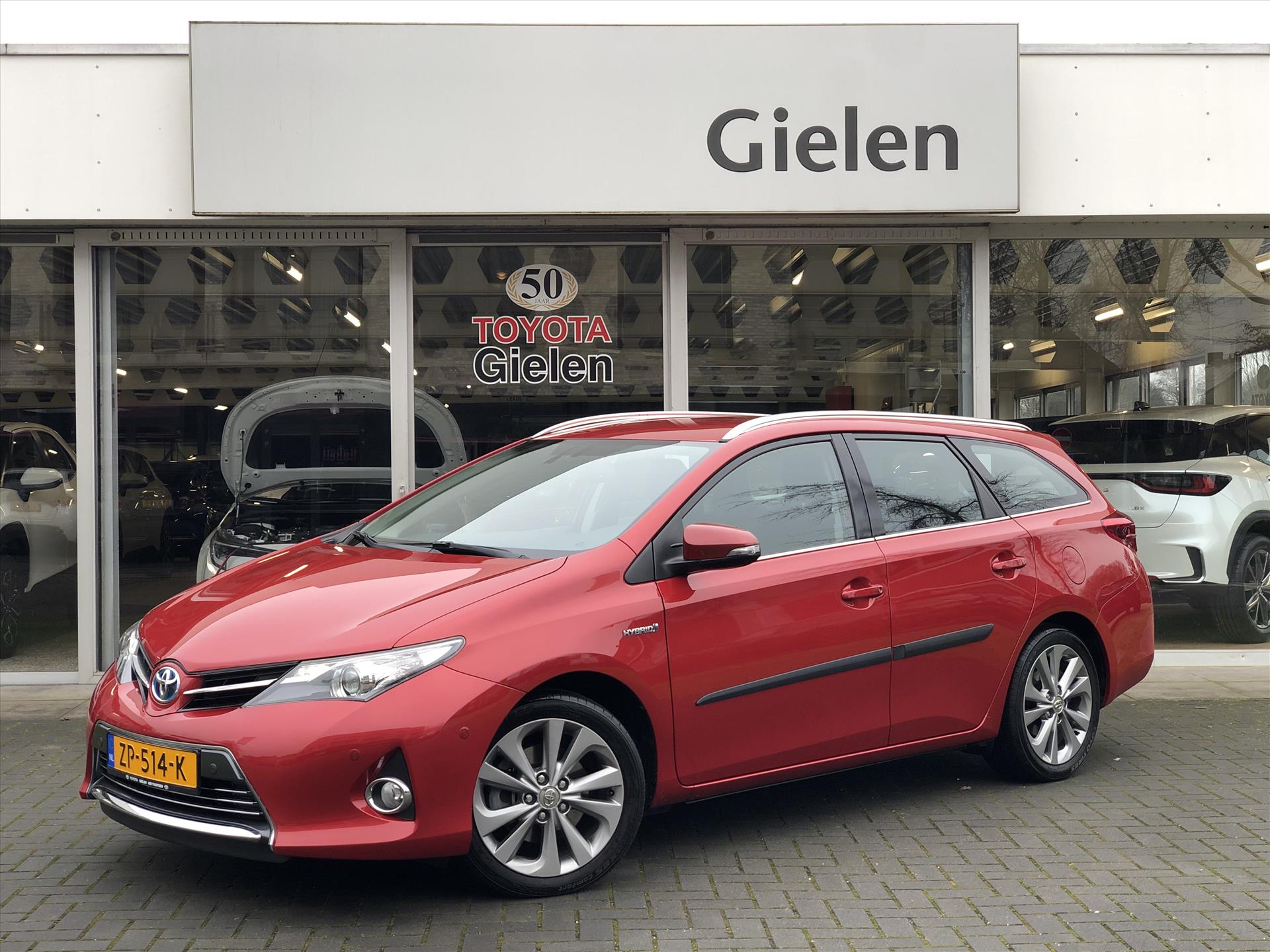 Toyota Auris Touring Sports 1.8 Hybrid Executive | Navigatie, Parkeersensoren, 17 inch, Half leer, stoelverwarming, Keyless 42245852-0.jpg | Autobedrijf Gielen
