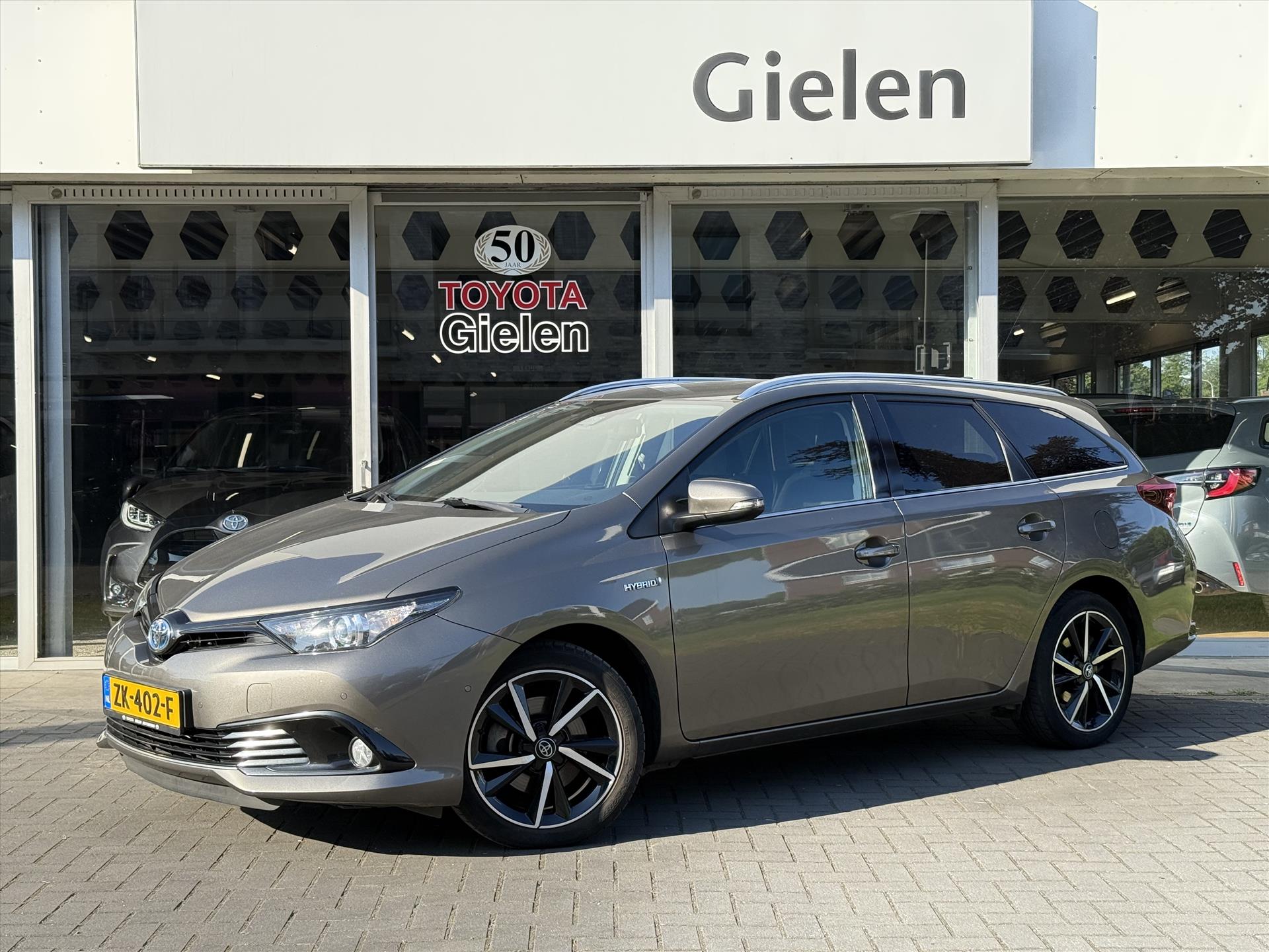 Toyota Auris Touring Sports 1.8 Hybrid Dynamic Ultimate | Eerste eigenaar, 17 inch, Stoelverwarming, Navigatie, Keyless, DAB 44982743-0.jpg | Autobedrijf Gielen