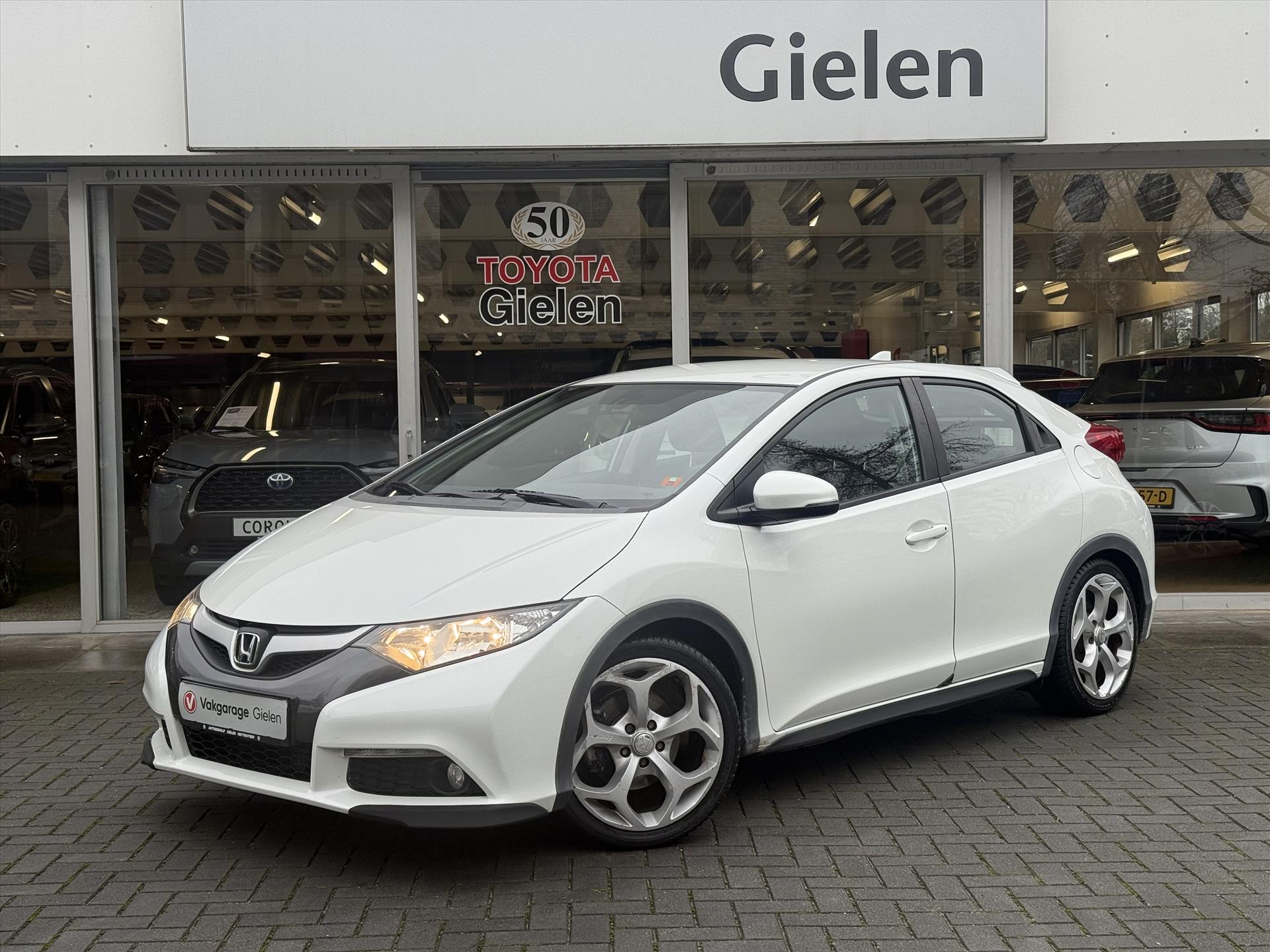 Honda Civic 1.4 100pk Sport | Trekhaak, Navigatie, Parkeercamera, Cruise control, 17 inch, Airconditioning 49428331-0.jpg | Autobedrijf Gielen
