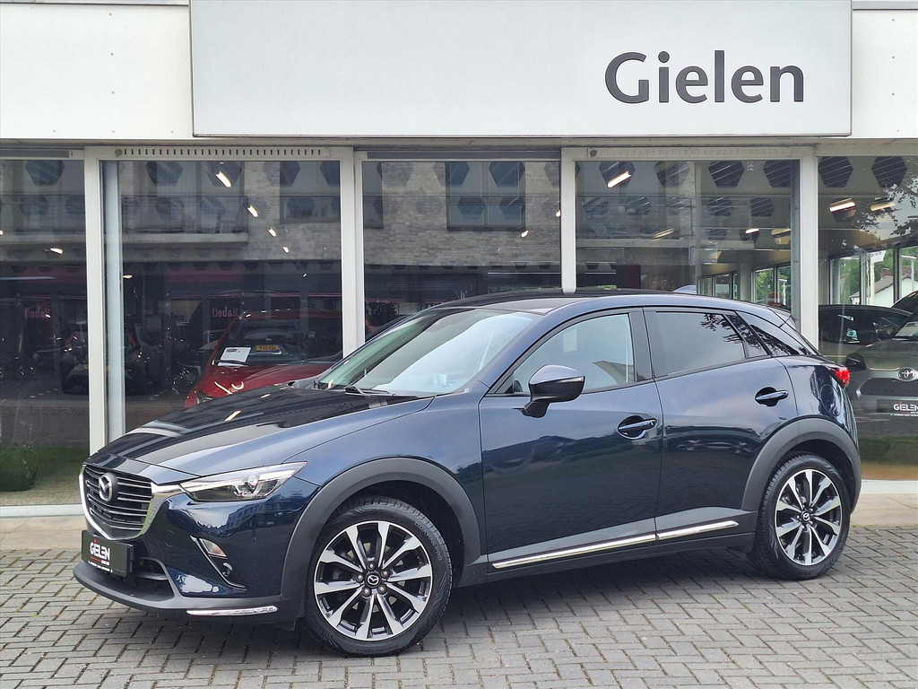 Mazda CX-3 2.0 SKYACTIV-G 121pk Luxury | Trekhaak, Dodehoekherkenning, Parkeersensoren, Apple Carplay/Android Auto, Stoelverwarming 53800193-0.jpg | Autobedrijf Gielen
